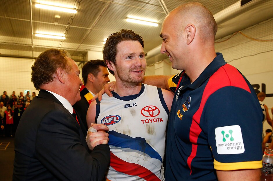 AFL 2015 Second Elimination Final - Western Bulldogs v Adelaide James Podsiadly with Patrick Dangerfield after last year's elimination final win over the Bulldogs - ${keywords}